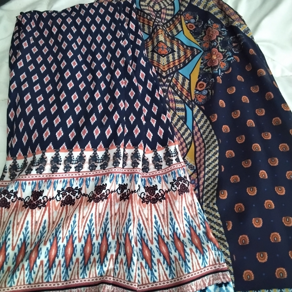 Two piece sleeveless tunic and pants